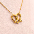 Eterna Heart Knot Necklace