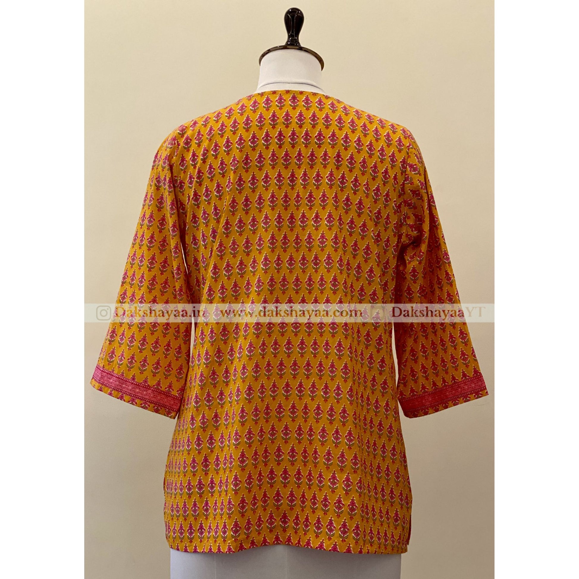 Back view of Kesariya Print Pure Cotton Short Kurti Top for Women – Vibrant Ethnic Wear M-3XL